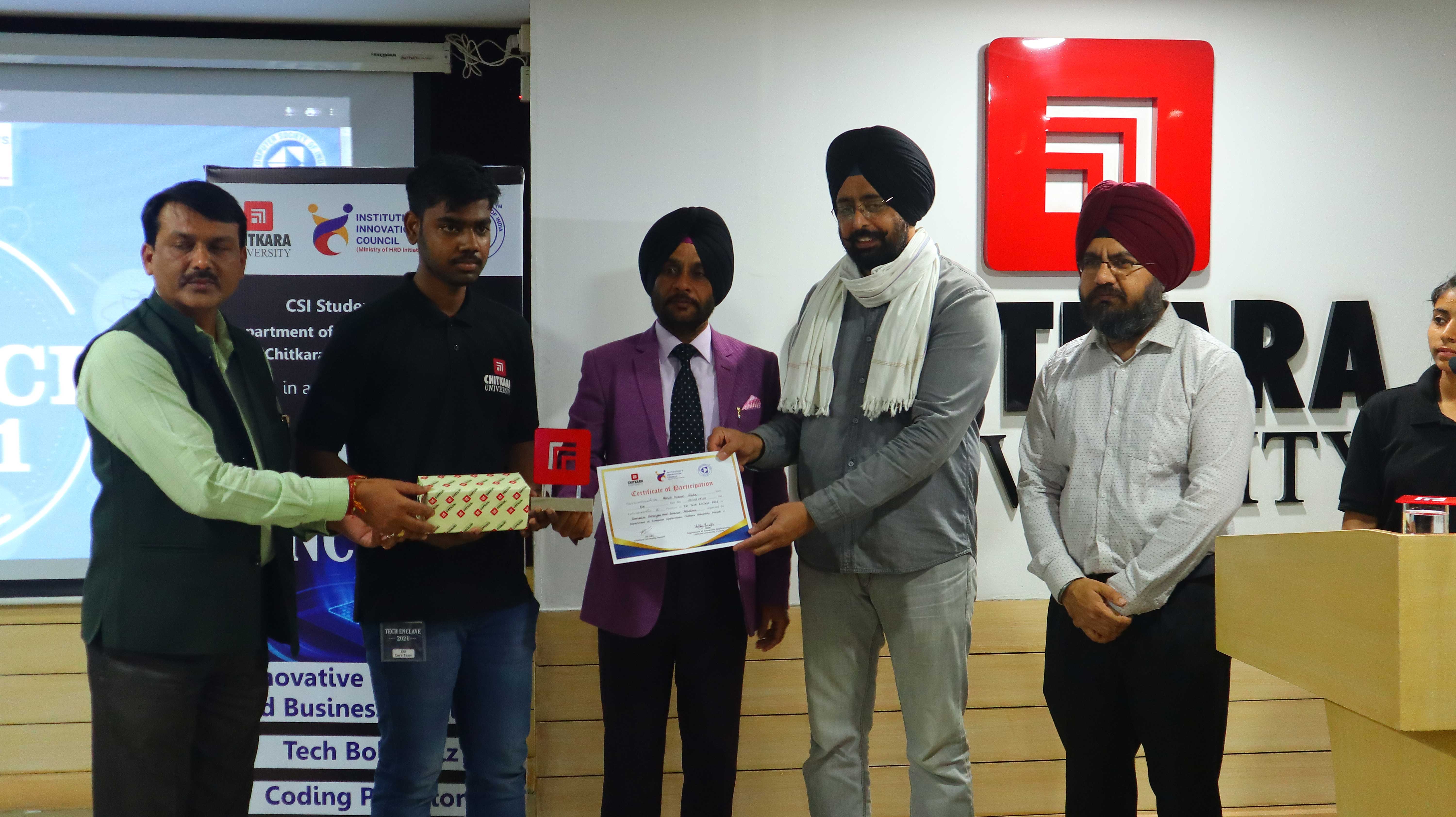 Receiving award from dean of department of computer applications, Chitkra University, Punjab